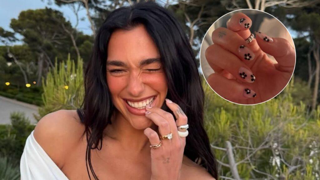 Manicura minimalista con margaritas negras: el look de uñas que impone Dua Lipa